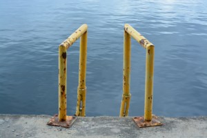 rusty ladder rail water
