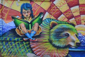 Urban Art Girl Reading Book